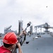 USS Mustin conducts a replenishment-at-sea with USNS Wally Schirra