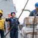 USS Mustin conducts a replenishment-at-sea with USNS Wally Schirra