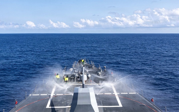 USS Mustin conducts a countermeasure washdown