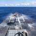 USS Mustin conducts a countermeasure washdown