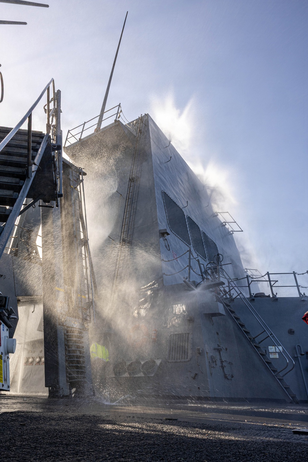 USS Mustin conducts a countermeasure washdown
