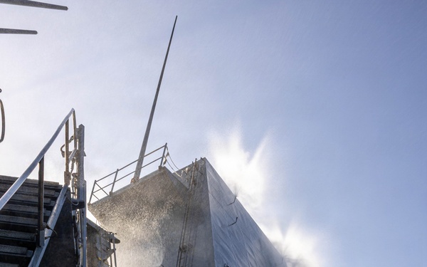 USS Mustin conducts a countermeasure washdown