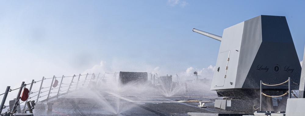 USS Mustin conducts a countermeasure washdown