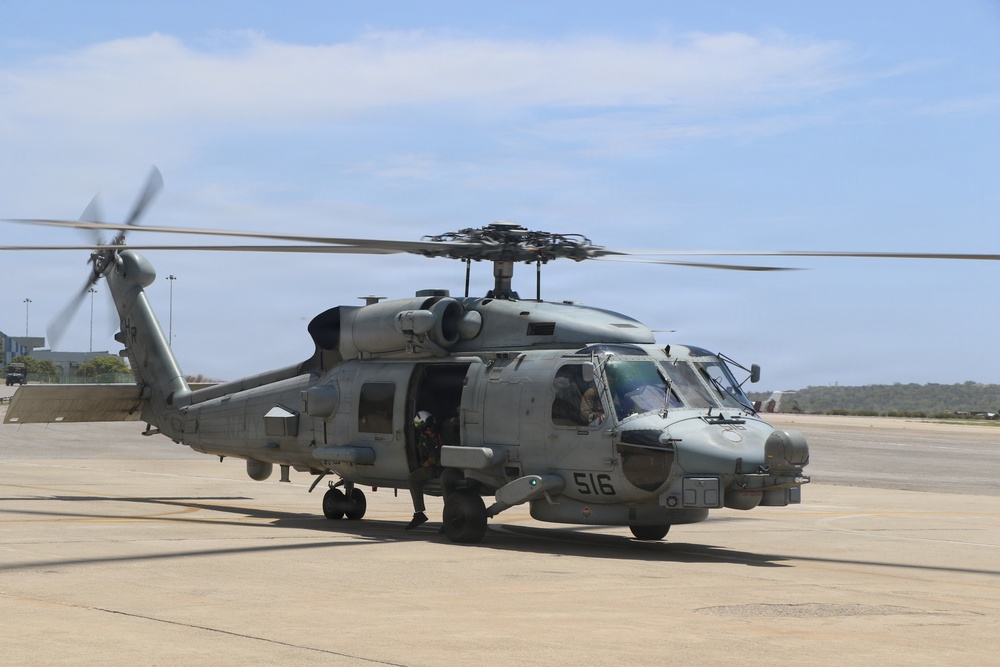 An MH-60R Seahawk helicopter, assigned to Helicopter Maritime Strike Squadron (HSM) 48, readies for flight.
