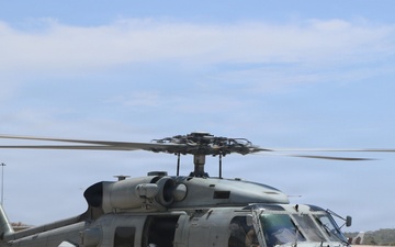 An MH-60R Seahawk helicopter, assigned to Helicopter Maritime Strike Squadron (HSM) 48, readies for flight.