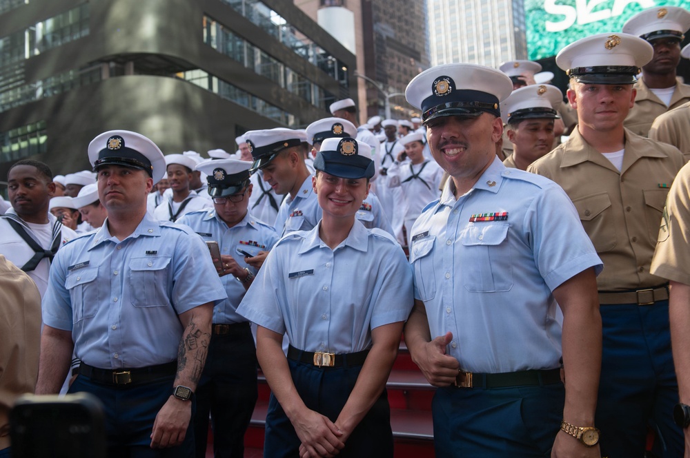 Sail 250 service members gather at Times Square Red Steps