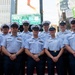 Sail 250 service members gather at Times Square Red Steps