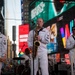 Sail 250 service members gather at Times Square Red Steps