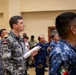 Multinational ship commands attend the PHOTOEX brief for RIMPAC 2026