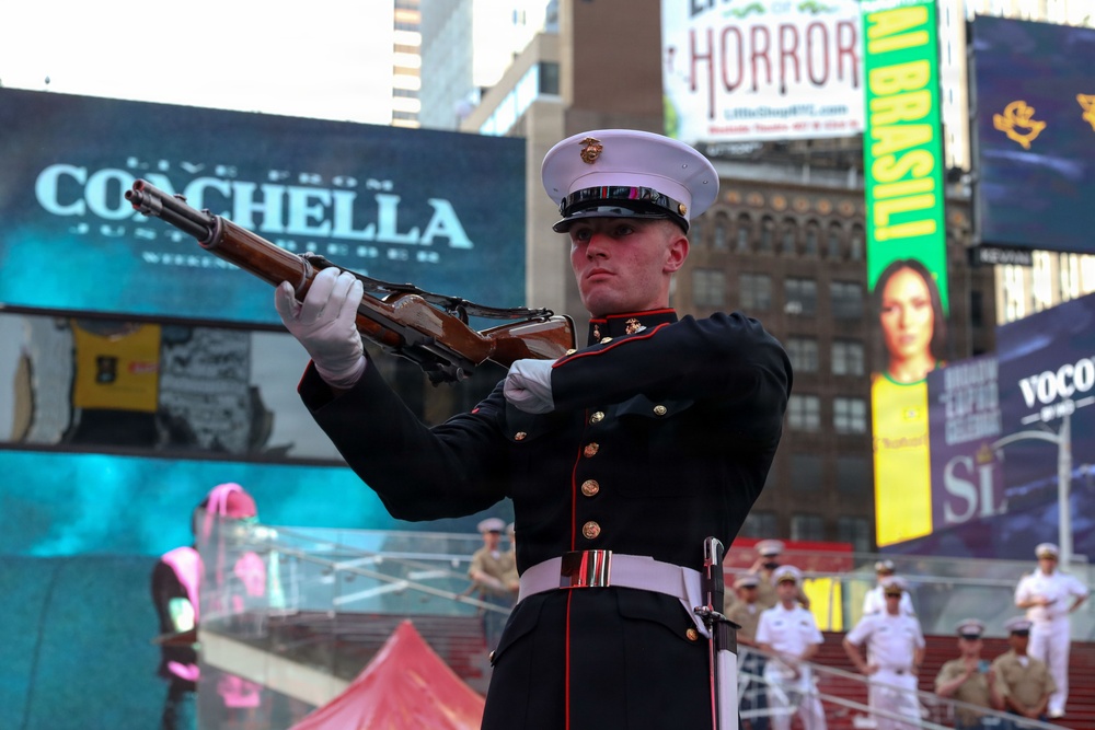 U.S. Marine Corps Silent Drill Platoon performs at Time Square for INR250