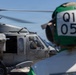 MV-22B Ospreys and MH-60 Seahawk execute embarking procedures on USS Makin Island