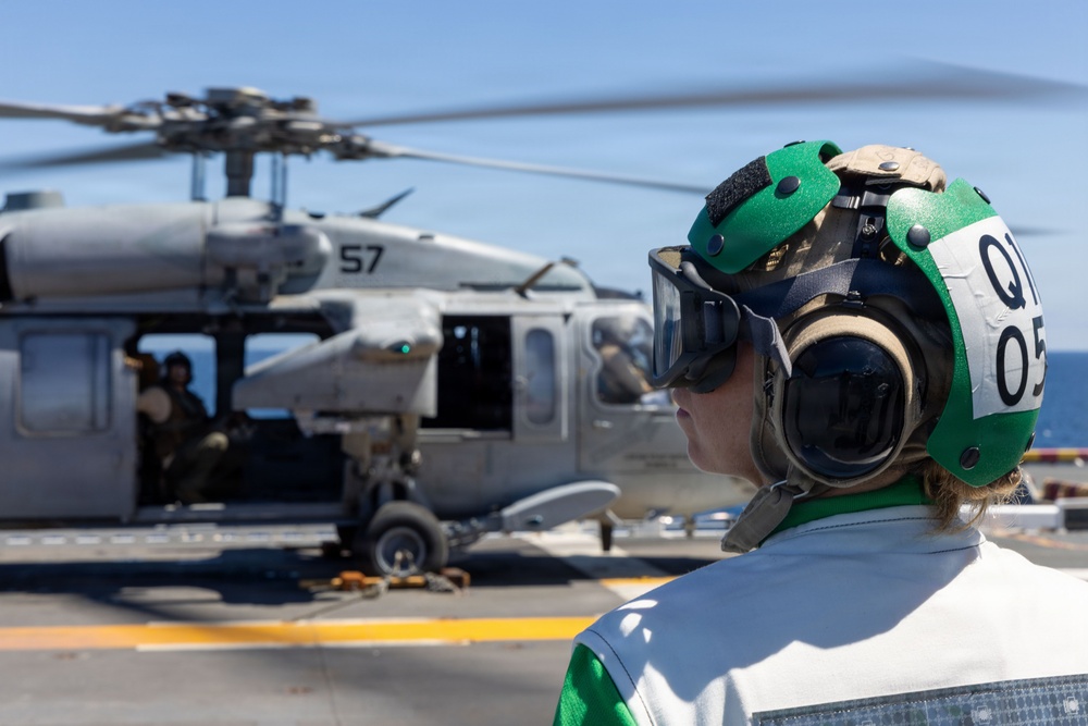MV-22B Ospreys and MH-60 Seahawk execute embarking procedures on USS Makin Island