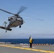 MV-22B Ospreys and MH-60 Seahawk execute embarking procedures on USS Makin Island