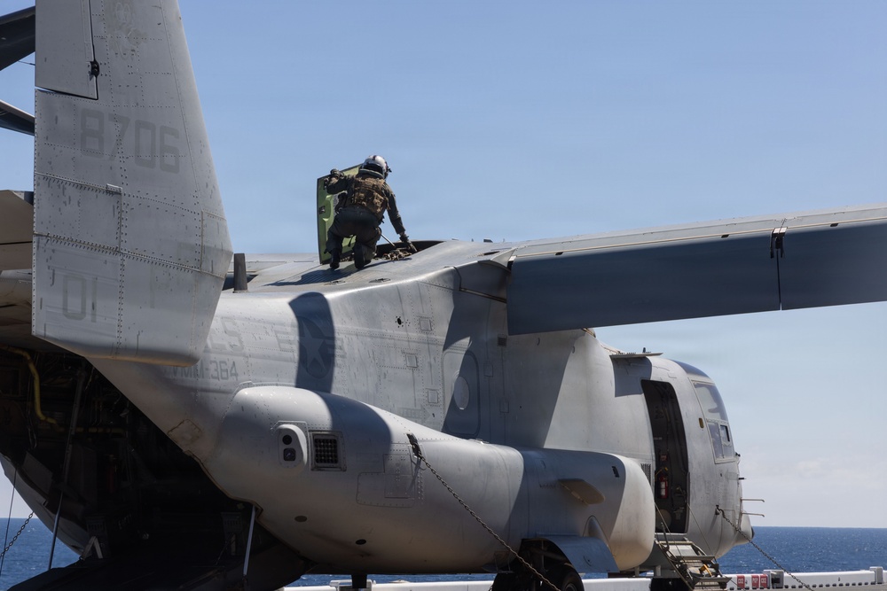MV-22B Ospreys and MH-60 Seahawk execute embarking procedures on USS Makin Island