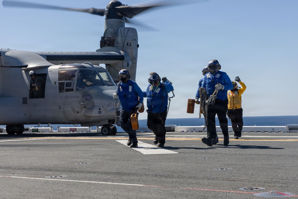 MV-22B Ospreys and MH-60 Seahawk execute embarking procedures on USS Makin Island