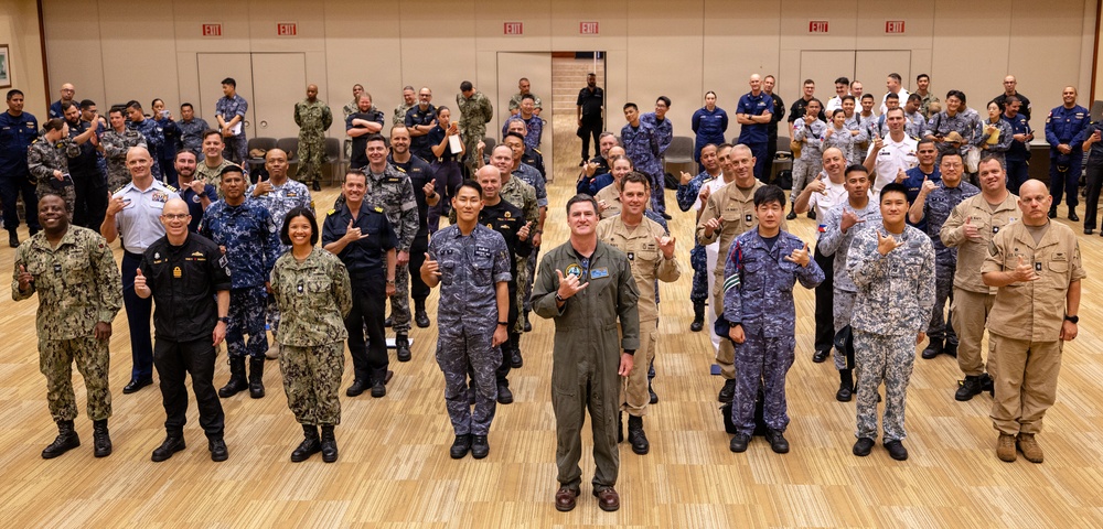 RIMPAC 2026 Participants Throw Shaka Sign Ahead of Photo Exercise