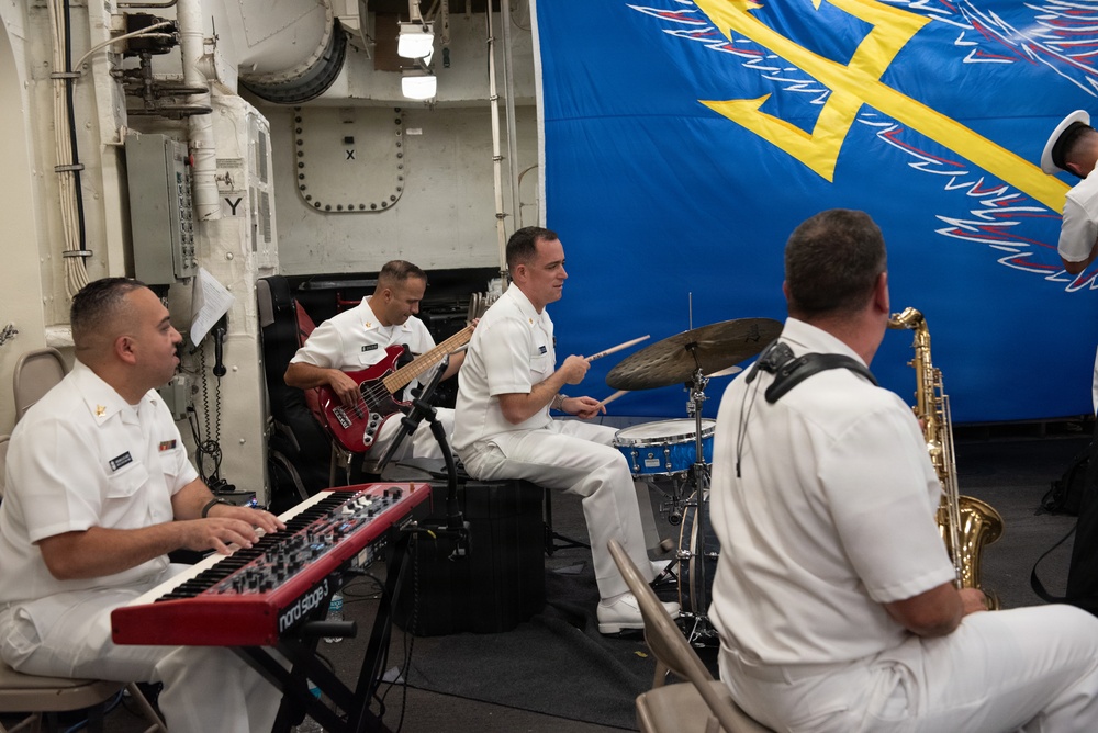 U.S. Navy Band Cruisers combo perform at the International Naval Review Welcome Ceremony