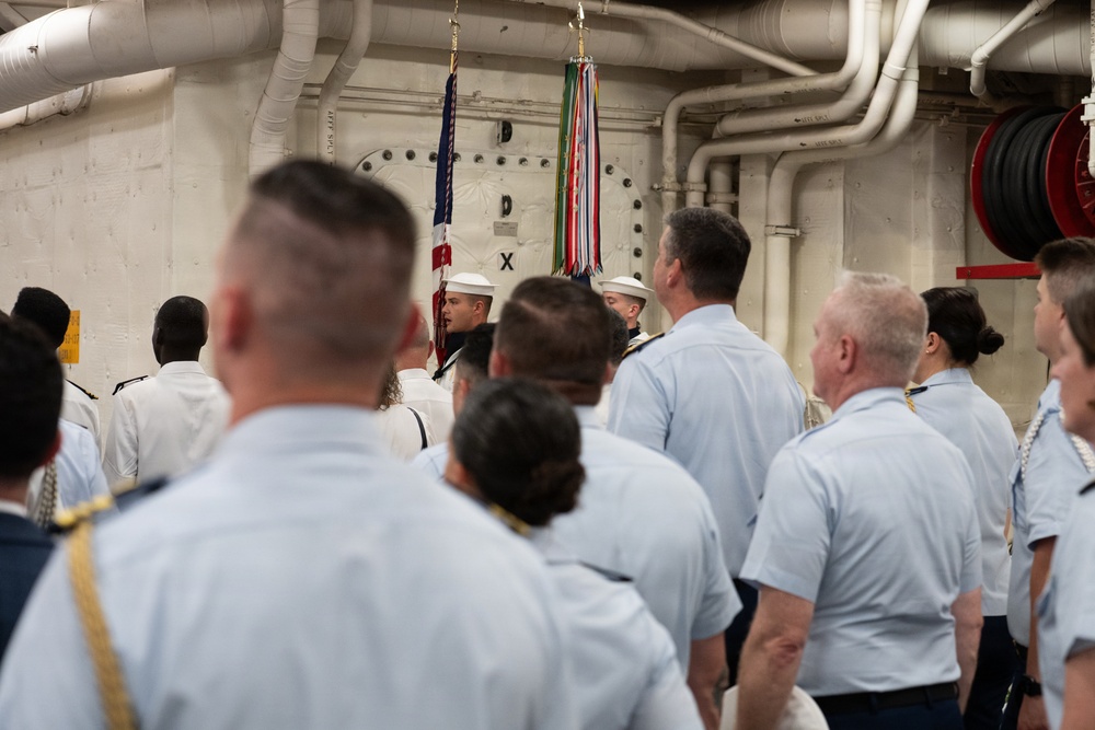 The U.S. Navy Ceremonial Guard present colors at the International Naval Review Welcome Ceremony