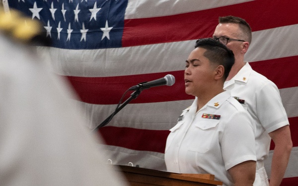 Musician 1st Class Danlie Cuenca performs the National Anthem at the International Naval Review Welcome Ceremony
