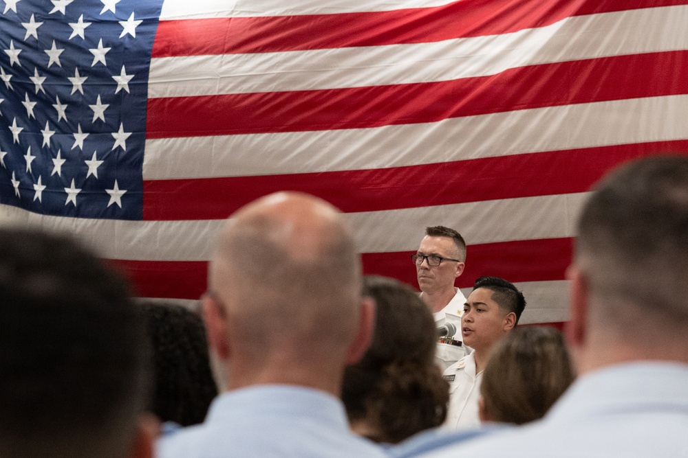 Musician 1st Class Danlie Cuenca performs the National Anthem at the International Naval Review Welcome Ceremony