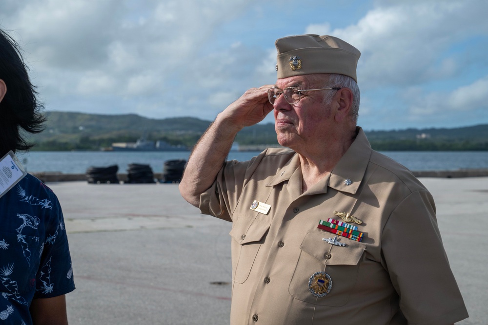 Retired U.S. Navy Cmdr. Allan Rigggs participates in morning colors aboard USS Annapolis
