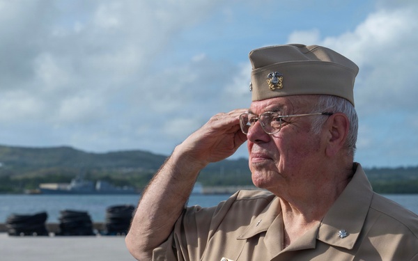 Retired U.S. Navy Cmdr. Allan Rigggs participates in morning colors aboard USS Annapolis