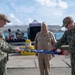 Retired U.S. Navy Cmdr. Allan Rigggs participates in morning colors aboard USS Annapolis