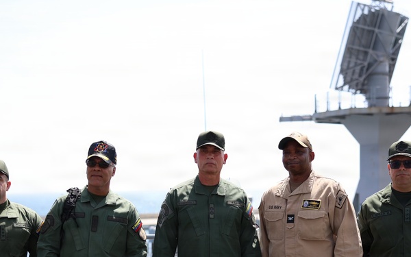 Venezuelan Army Maj. Gen. Delfín Alfredo Espinoza Torres, personnel director for the Bolivarian National Guard, tours the San Antonio-class amphibious transport dock ship USS Fort Lauderdale.