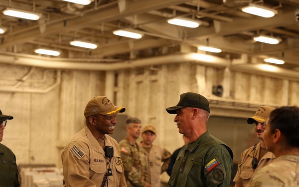 Venezuelan Army Maj. Gen. Delfín Alfredo Espinoza Torres, personnel director for the Bolivarian National Guard, tours the San Antonio-class amphibious transport dock ship USS Fort Lauderdale.