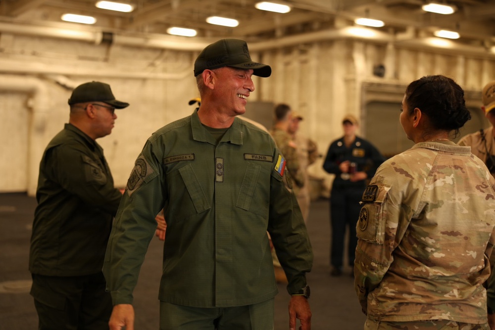 Venezuelan Army Maj. Gen. Delfín Alfredo Espinoza Torres, personnel director for the Bolivarian National Guard, tours the San Antonio-class amphibious transport dock ship USS Fort Lauderdale.