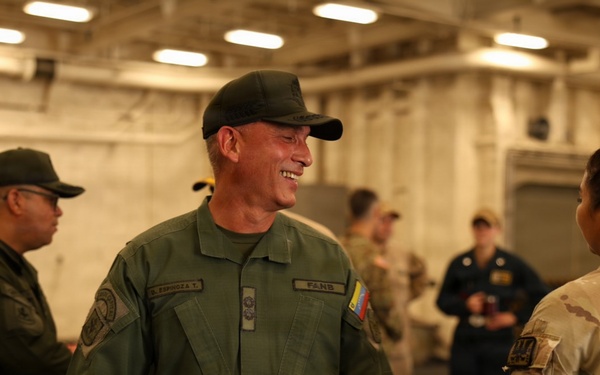 Venezuelan Army Maj. Gen. Delfín Alfredo Espinoza Torres, personnel director for the Bolivarian National Guard, tours the San Antonio-class amphibious transport dock ship USS Fort Lauderdale.
