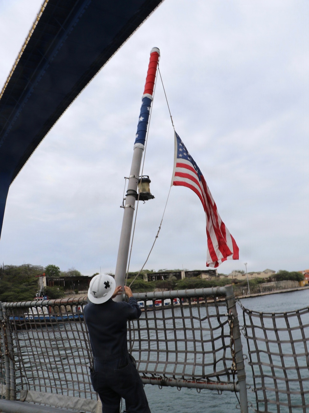 U.S sailors aboard the littoral combat ship USS Billings (LCS 15) conduct a sea and anchor detail as the ship arrives in Willemstad, Curacao, July 3, 2026.