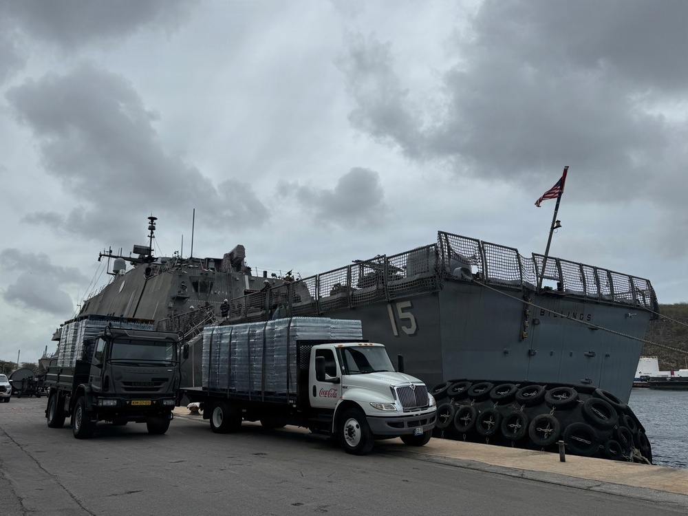 U.S. Navy Sailors load water donated by the Netherlands aboard the littoral combat ship USS Billings (LCS 15) while moored in Willemstad, Curacao, July 3, 2026.