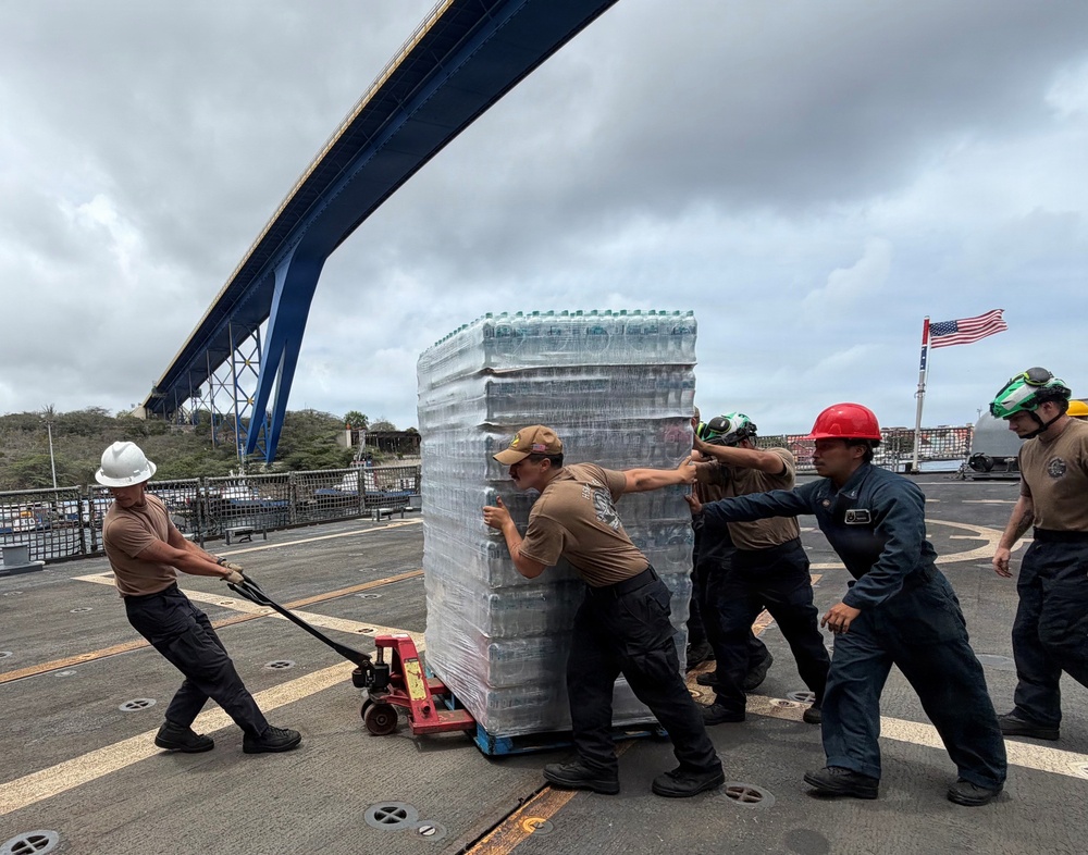 U.S. Navy Sailors load water donated by the Netherlands aboard the littoral combat ship USS Billings (LCS 15) while moored in Willemstad, Curacao, July 3, 2026.
