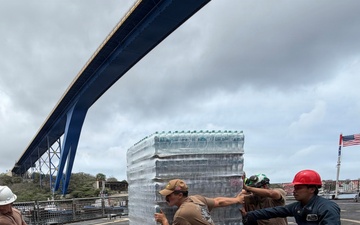 U.S. Navy Sailors load water donated by the Netherlands aboard the littoral combat ship USS Billings (LCS 15) while moored in Willemstad, Curacao, July 3, 2026.