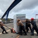U.S. Navy Sailors load water donated by the Netherlands aboard the littoral combat ship USS Billings (LCS 15) while moored in Willemstad, Curacao, July 3, 2026.
