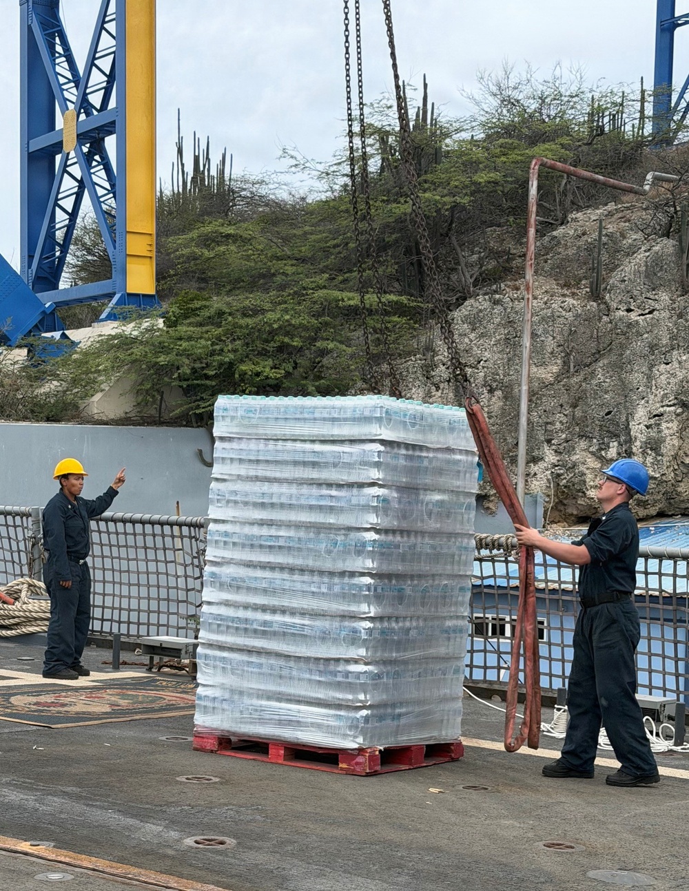 U.S. Navy Sailors load water donated by the Netherlands aboard the littoral combat ship USS Billings (LCS 15) while moored in Willemstad, Curacao, July 3, 2026.