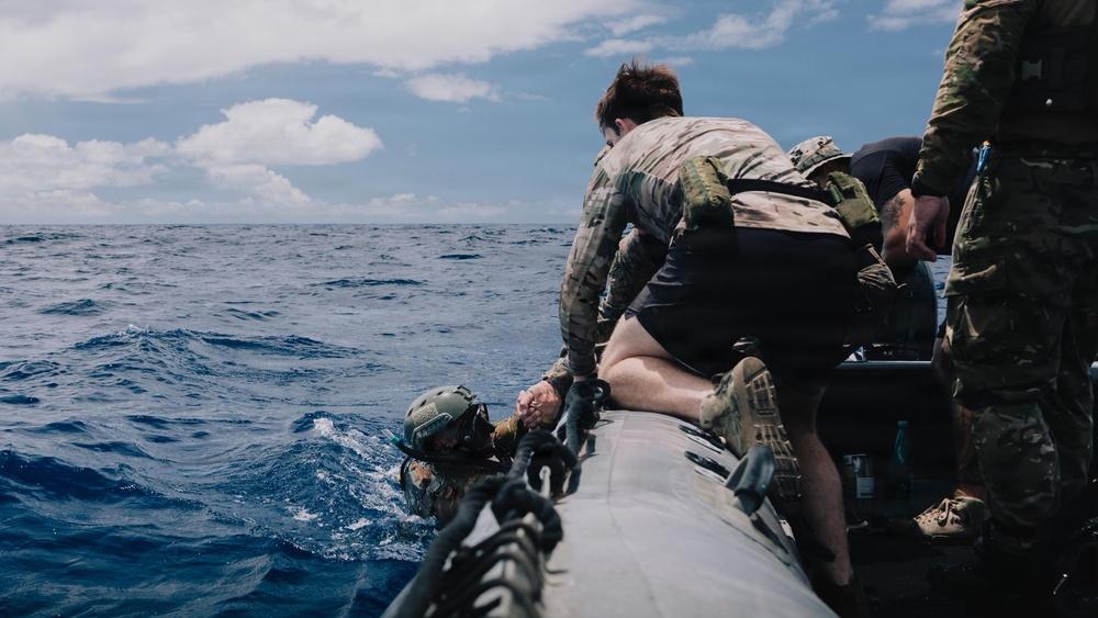 U.S. Navy, U.S. Marine Corps, and Royal New Zealand Navy EOD technicians conduct mine countermeasures training during RIMPAC 26