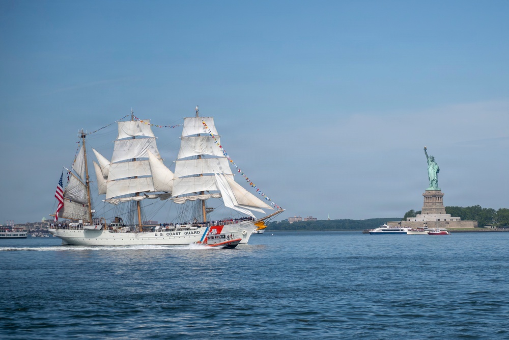U.S. Coast Guard Cutter Eagle sails past the Statue of Liberty during Sail 250