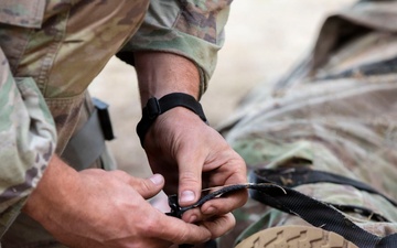 Army National Guard Soldier completes medical lane during Expert Soldier Badge assessment