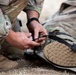Army National Guard Soldier completes medical lane during Expert Soldier Badge assessment
