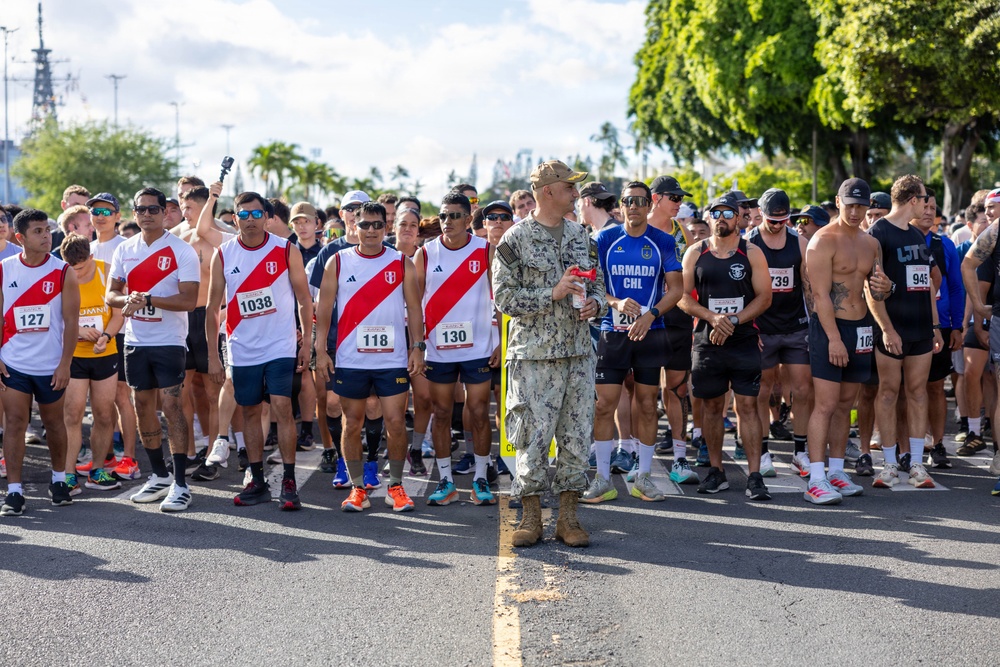 Base Leadership Signals Start of RIMPAC 2026 Holiday 5K Run