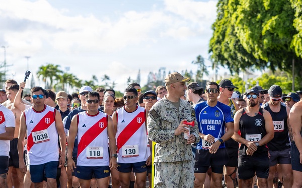 Base Leadership Signals Start of RIMPAC 2026 Holiday 5K Run