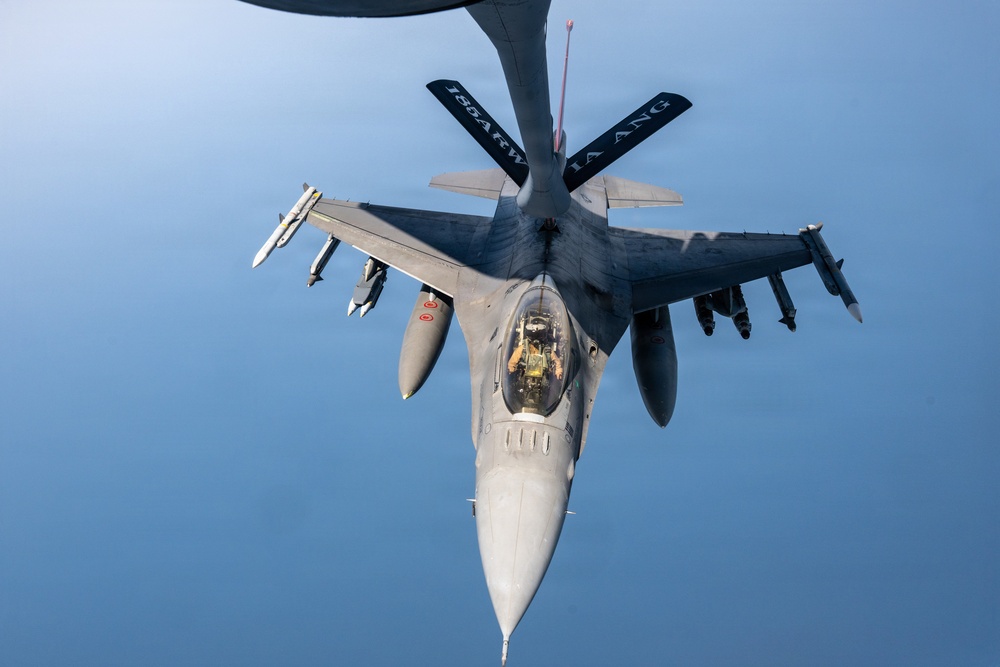 KC-135 refuels F16s for regional security
