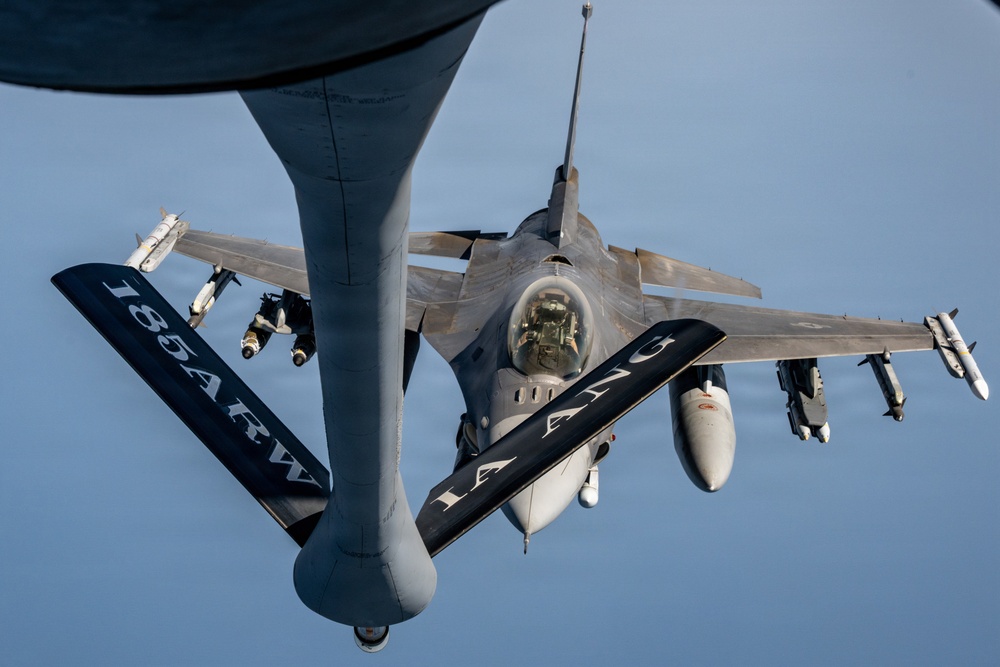 KC-135 refuels F16s for regional security