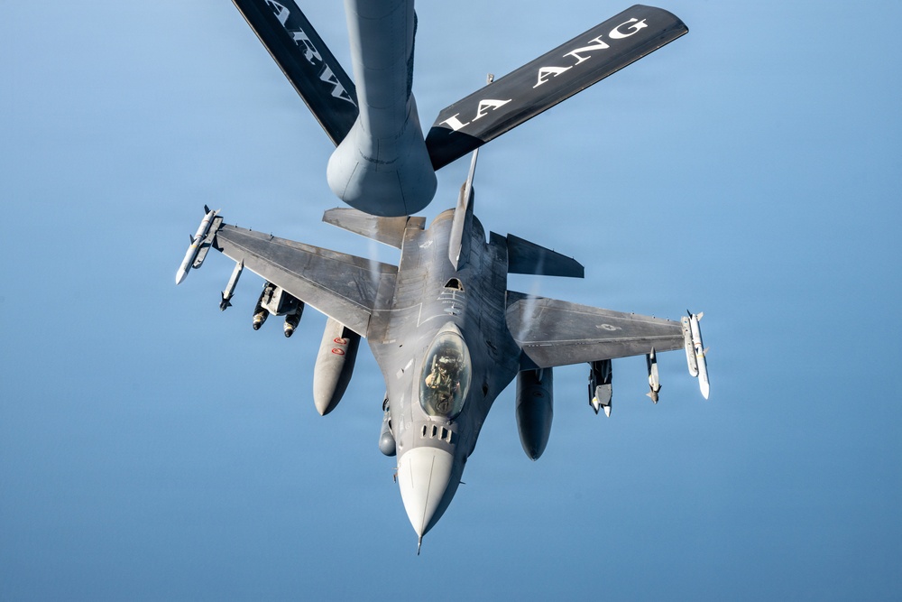 KC-135 refuels F16s for regional security