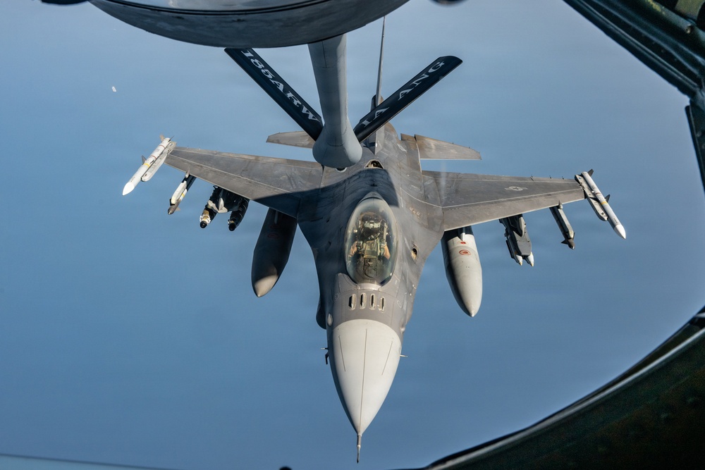 KC-135 refuels F16s for regional security