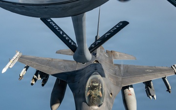 KC-135 refuels F16s for regional security