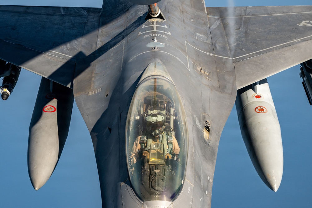 KC-135 refuels F16s for regional security