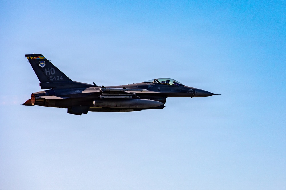 F-16 Fighting Falcon departs with afterburner